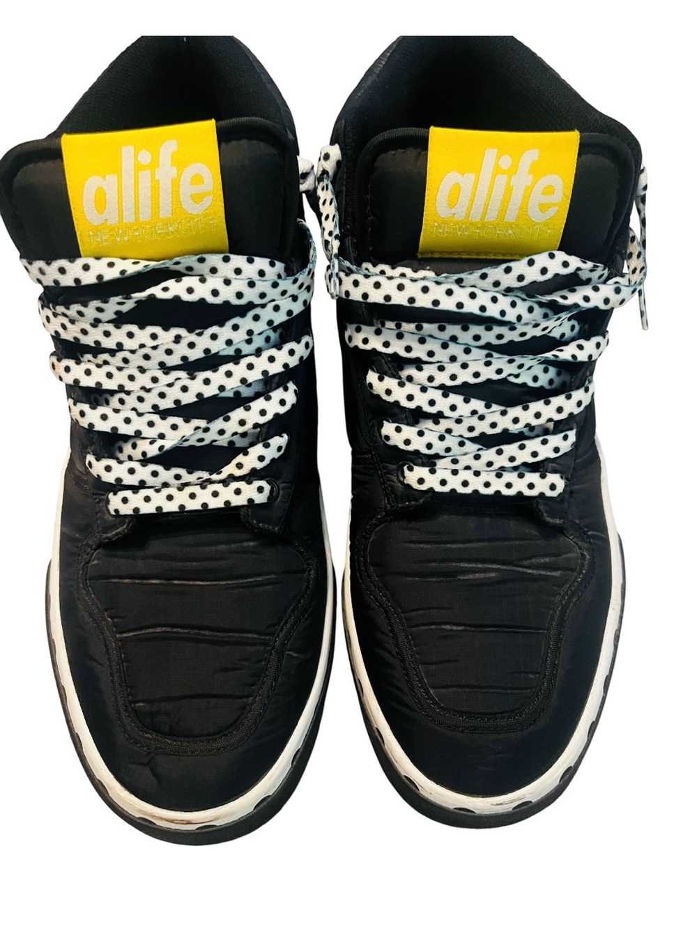 Alife Black High-Top Sneakers with Yellow Logo and White Polka Dot Laces